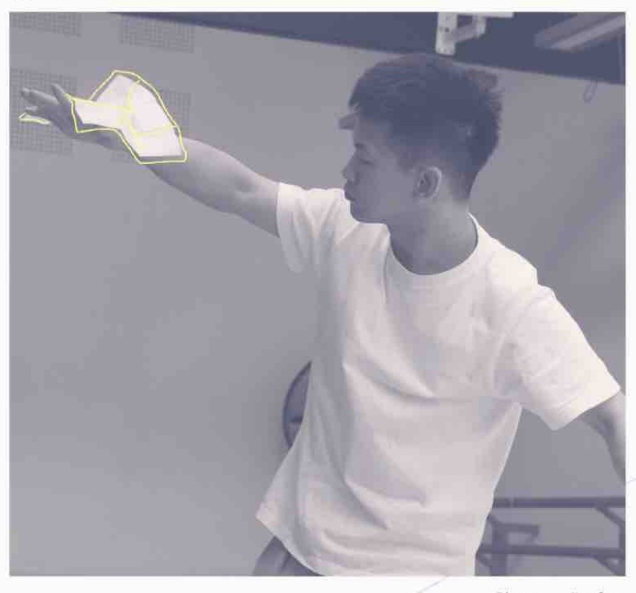 A dancer extending an arm