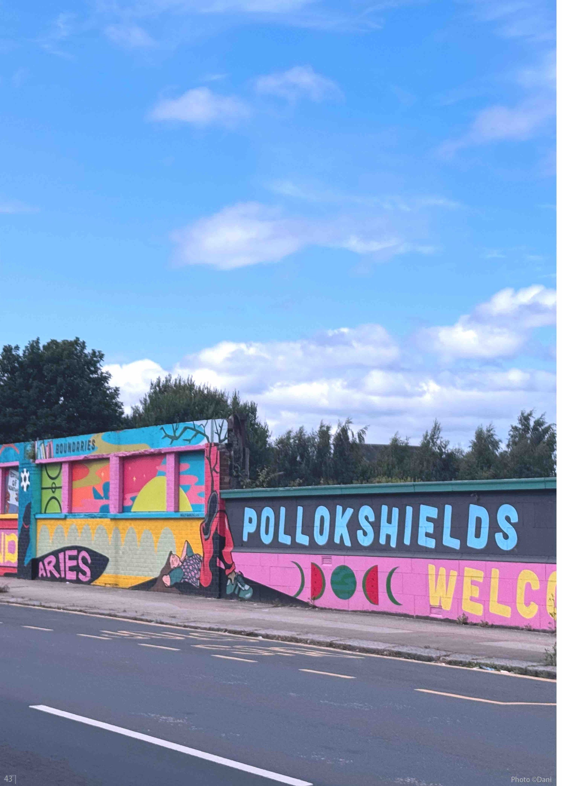 A colourful outdoor festival sign
