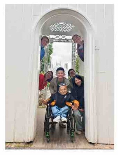Artists standing in a doorway